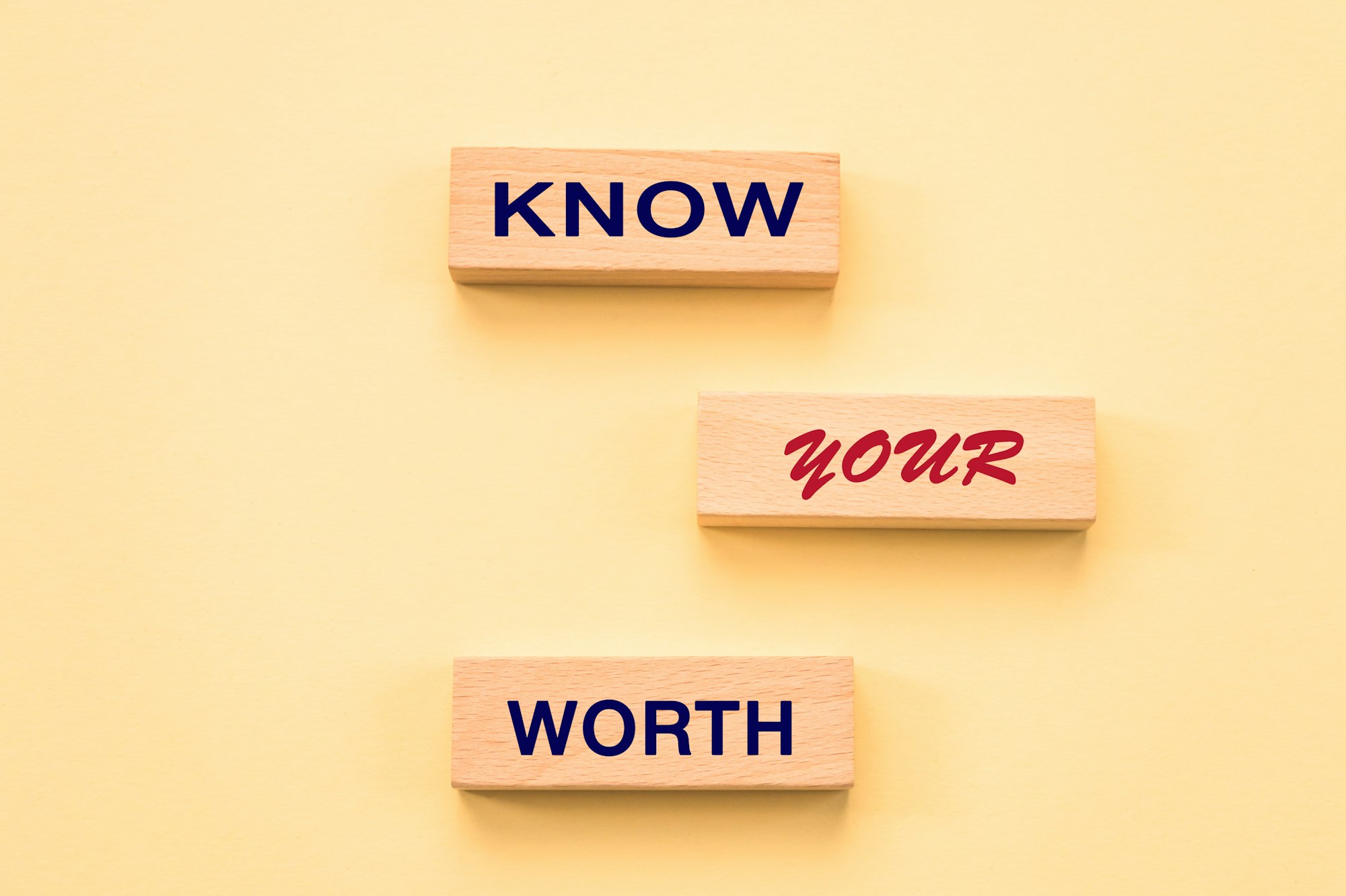 Know Your Worth on wooden blocks. Self motivation coaching HR concept.